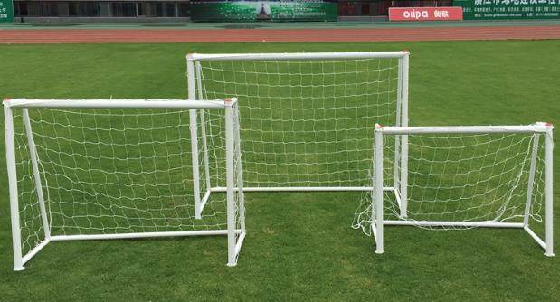 3 people making 32mm football door casual football door family activities portable ball type supplies to the ball net