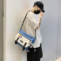 Slipper bag male tide casual shoulder bag boy colour backpack female middle school student Japanese skewed mailbag bag