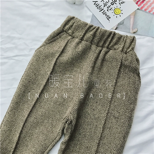 Quần áo thu đông 2018 mới cho bé gái Hàn Quốc phối đồ họa tiết hoa văn trẻ em hoang dã quần dài len quần cà rốt