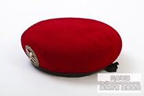Original second-hand beret with hat emblem
