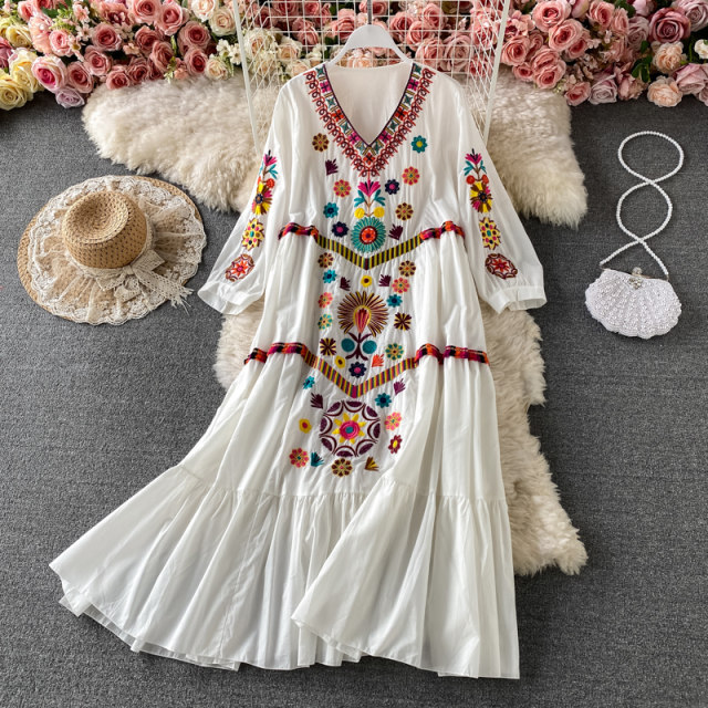 Seaside vacation beach skirt Bohemia loose travel shoot big swing long skirt ethnic style embroidered V-neck dress