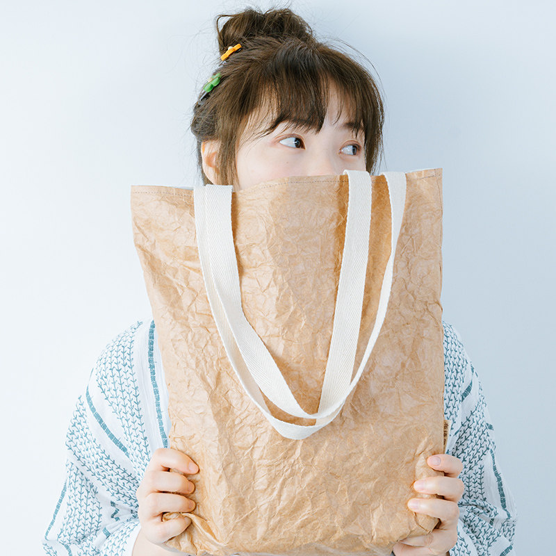 CB Dongyin joint name washable cowhide DuPont paper bag large capacity shopping bag portable shoulder fold not torn