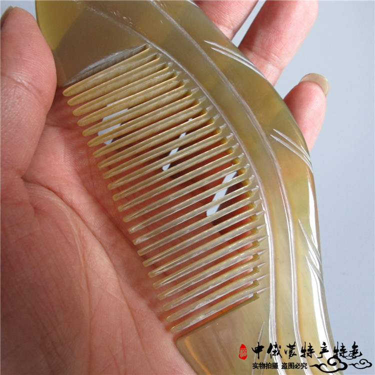 White buffalo angle comb naturally thick authentic large - scale pure angle massage anti - static engraving