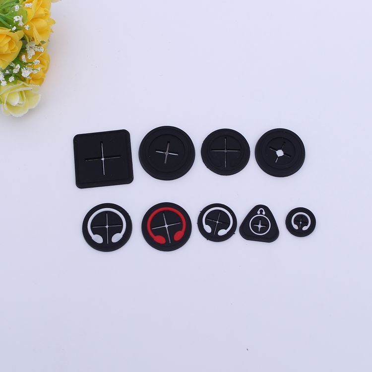 Factory direct sales spot MP3 headphone hole backpack handbag clothing and other cross glue stamp drip plastic trademark