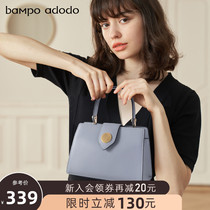 Half slope adodo cowhide bag Women New Tide Joker round buckle Hand bag commute retro shoulder shoulder bag