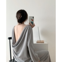 The sagging fabric in the ICTS sculpture is restrained and the cold and the sexy gray-toned sled collar backless blouse air pants
