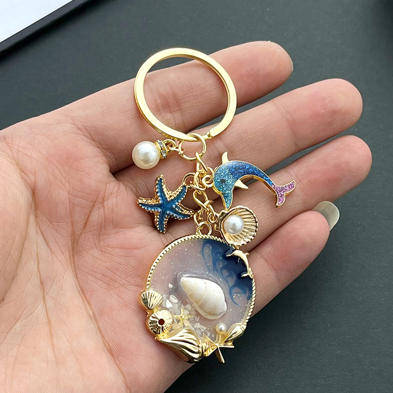 Creative and Simple Ocean-Themed Keychain with Starfish, Mermaid, Seashell, Dolphin, Conch, and Bag Charm as a Small Gift