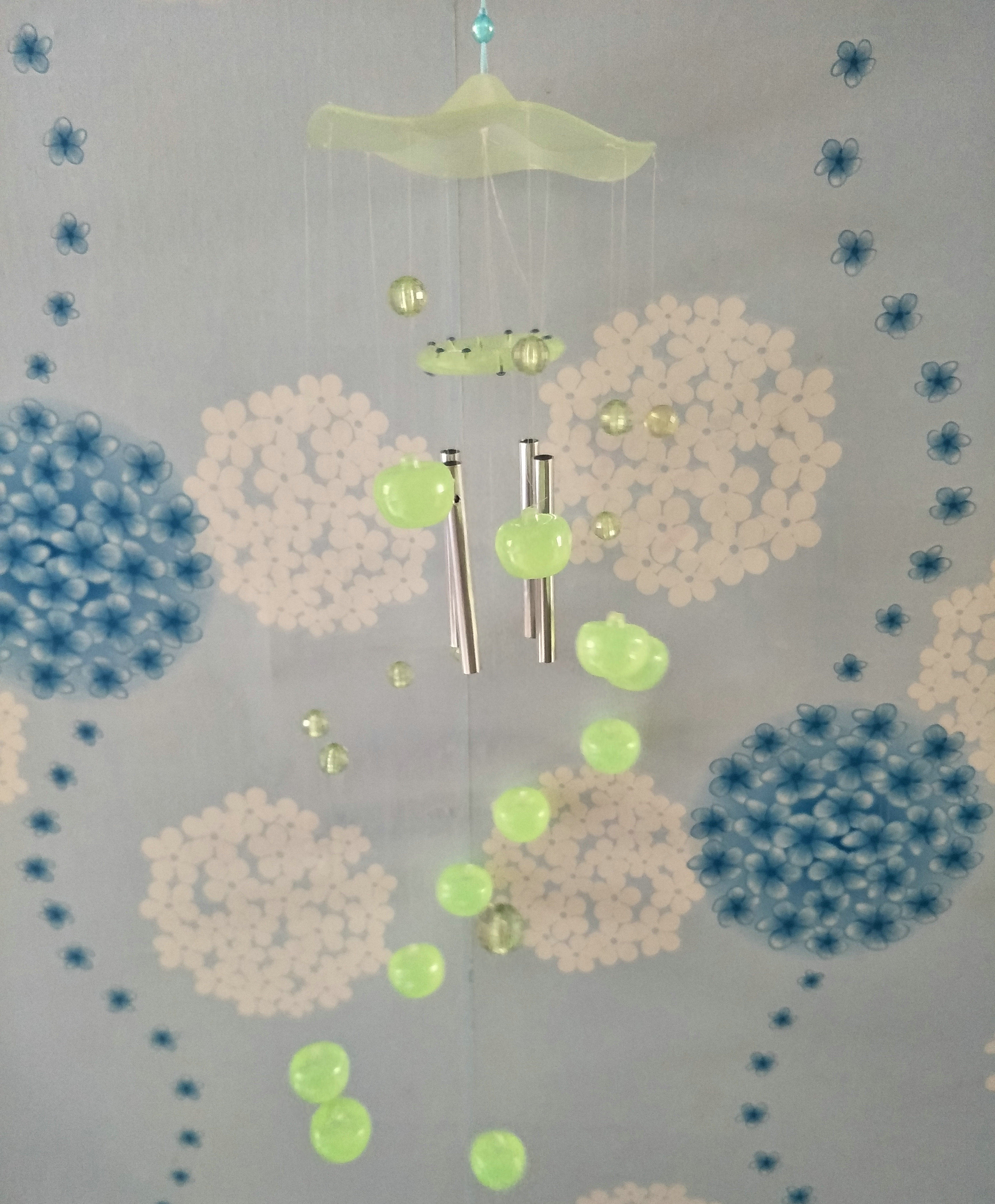 Nostalgic old stock of green wind chimes of stars