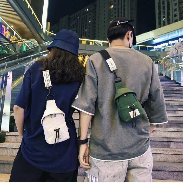 Túi ngực nam 2019 new triều siêu lửa thương hiệu túi nhỏ vải canvas crossbody thể thao cá tính túi đeo vai - Túi của con người