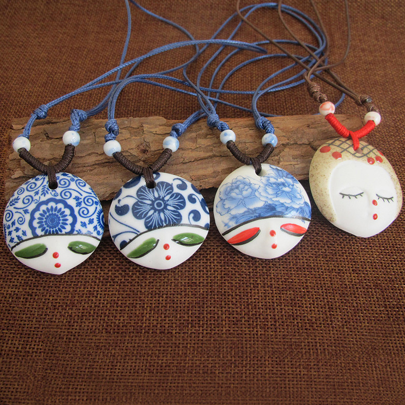 Ethnic blue and white porcelain hand-painted doll head ceramic jewelry necklace pendant women's sweater chain long version stall