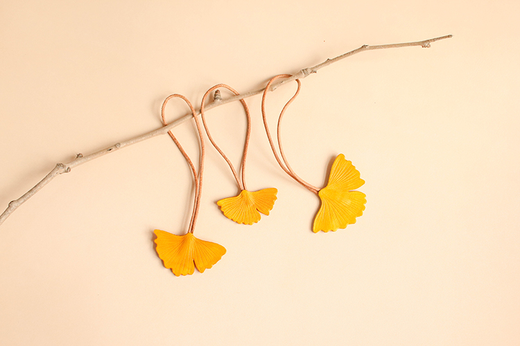 Pure cow leather handmade gingko buns bag pendant hanging decoration key buckle woolen clothing chain simple and mobile phone hanging rope