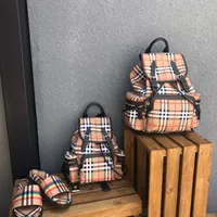 Ngôi sao mới với cùng một đoạn giản dị Anh vải Oxford kẻ sọc DrawString dây đeo vai túi xách da ba lô da - Ba lô balo đi học nam cấp 2