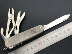 91mm Swiss Army Knife Luxury Tinker 1.4723 ດັດແກ້ 3-layer tc4 titanium handle titanium partition