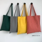 Чистого цвета пустые ручные сумки с холста