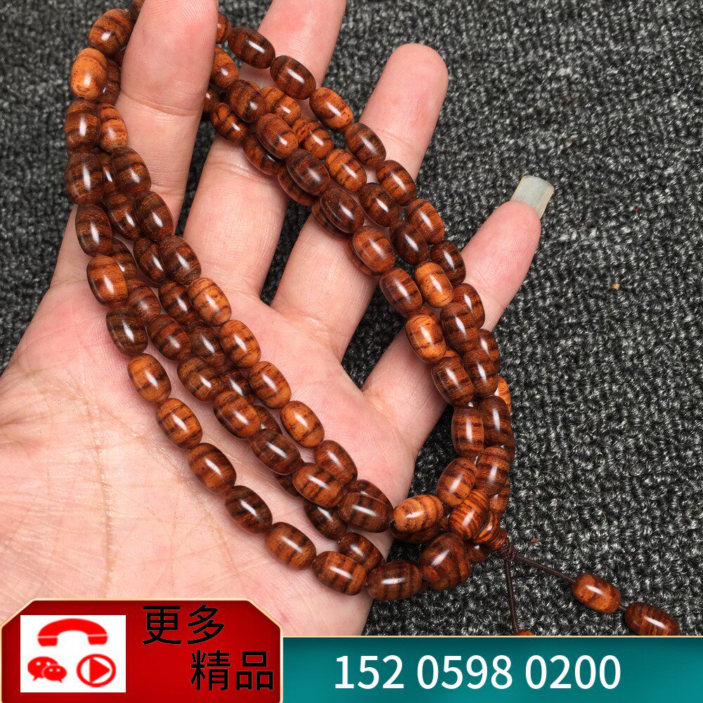 Sea butter pear old material tiger skin mountain water pattern female multi-layer hand chisel Hainan Huanghua pear 0 6*1 0 rice beads bracelet