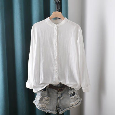 This Japanese-style artistic small stand-up collar solid-color cotton yarn base shirt is simple, elegant and versatile. It's a basic white shirt for women