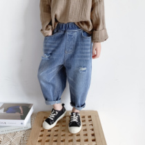 2022 Spring and autumn male and female childrens baby Han version neutral breaking hole handsome gas 100 lap pure cotton denim radish pants haren pants tide
