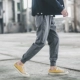 GBOY mùa thu Nhật Bản màu rắn chân hoang dã quần nam thanh niên thời trang đường phố giản dị dây rút quần harem