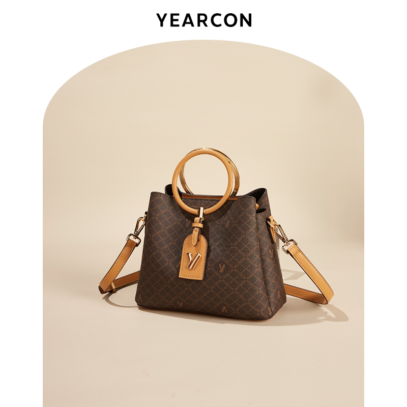 Yierkang bag 2021 new one-shoulder Messenger high-end fashion niche design sense portable bucket women's bag trend