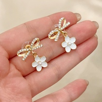 (Xiao Yues family) Real beat the Korean butterfly knot flower earrings 