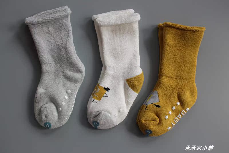 Mùa thu đông mẫu cotton dày terry bé trai vớ chống trượt keo bé vớ cao quần tất 3d cho bé gái