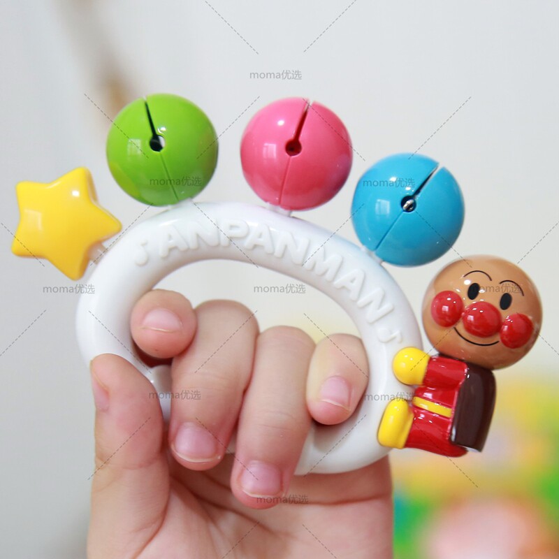 Spot Japanese Pinocchio Bread Superman Toy rings drum sandhammer and soothes hands ringing bells