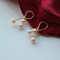 Japan and South Korea twist invisible freshwater pearl ear clip gold handmade painless ear hole mosquito coil temperament earring