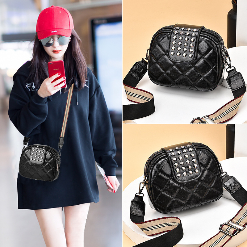 Hong Kong 2022 net red rivet small round bag new summer fashion popular backpack female Western style simple shoulder pet bag