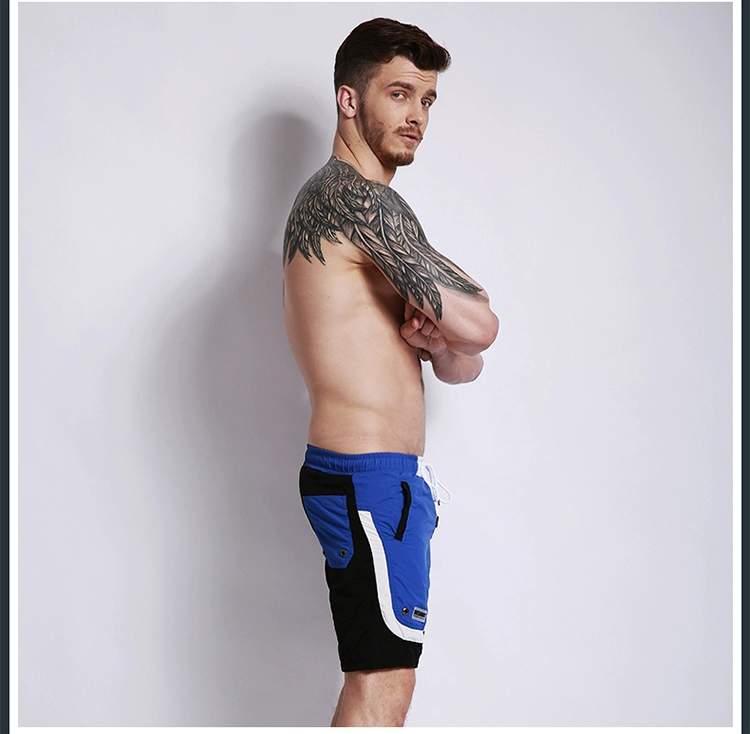Quần short nam đi biển khô nhanh có thể xuống nước quần short bơi lội nước mùa hè quần short bơi lội đi biển mùa hè quần short thông thường - Quần bãi biển