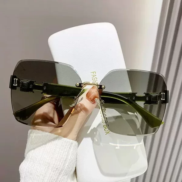 Live explosion fashion sunglasses INS ladies high sense frameless sunglasses outdoor UV protection driving sunshade