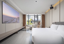 Nanxing Garden Intelligent Cinema Hotel (Hailv Duty Free City Branch) Viewing·Intelligent Audio-visual King Room
