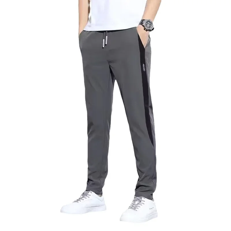 Men's new summer ice silk thin stretch casual trousers wear-resistant, dirt-resistant, loose straight sports pants breathable