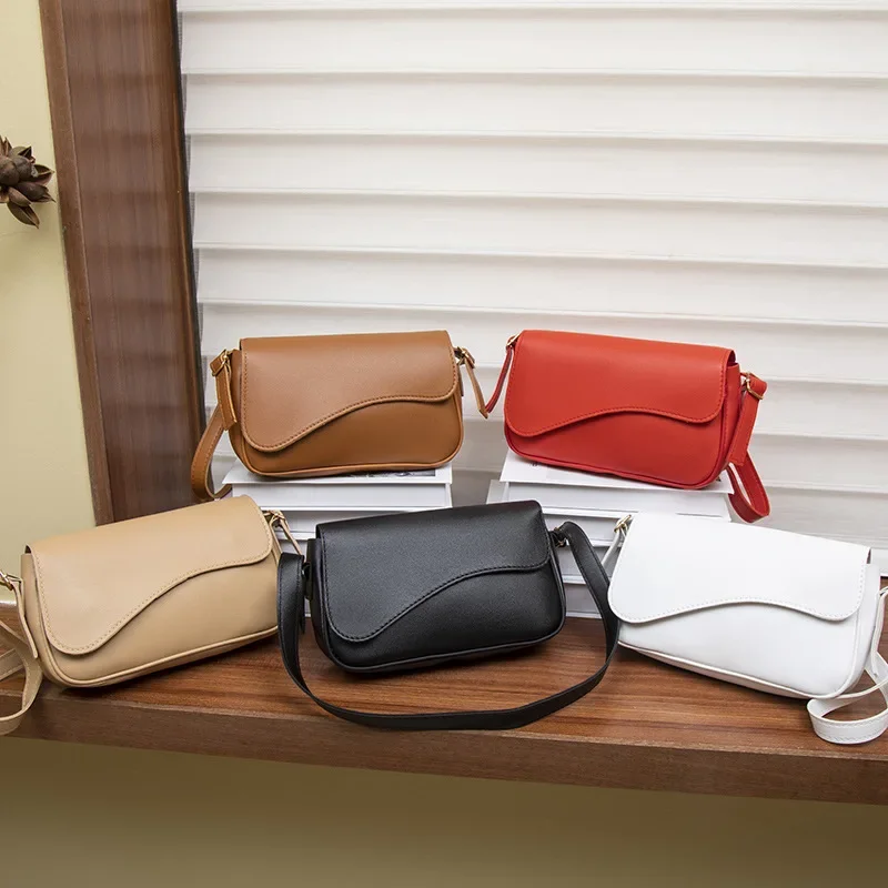 Cross-border fashion women's bag 2025 new portable shoulder women's bag slung Joker retro design bag a generation of hair