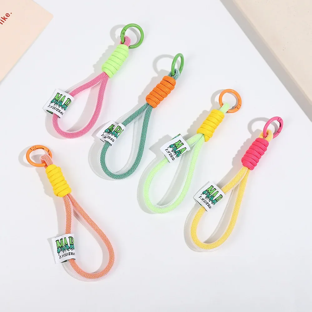 Mobile phone lanyard key chain pendant water cup belt rope men and women students woven wrist rope schoolbag pendant wholesale
