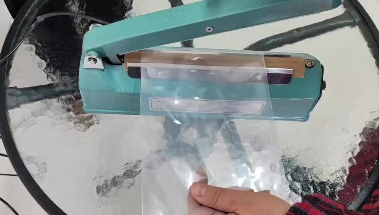 Hand Press Plastic Bag Sealing Machine With Edge Knife Small Sealing