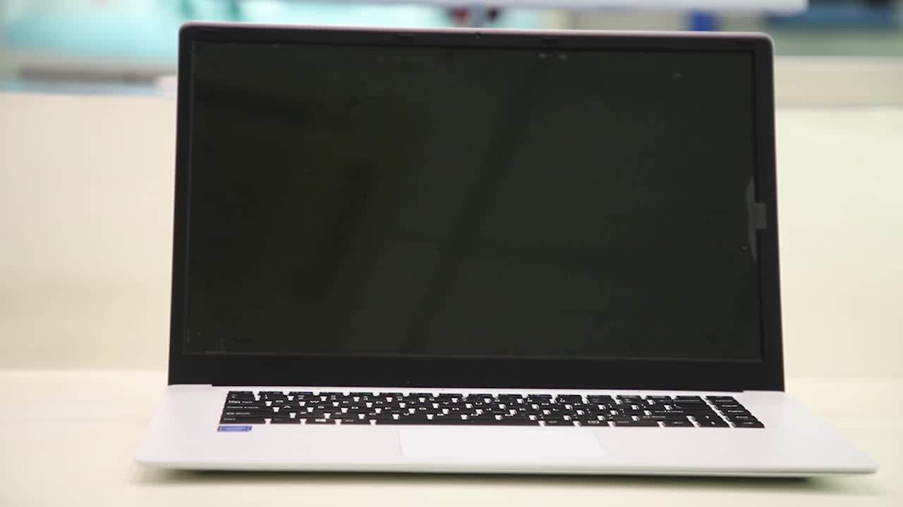 New Cheap Portable 15.6 Inch Mini Laptop Ultra Thin Intel Quad Core