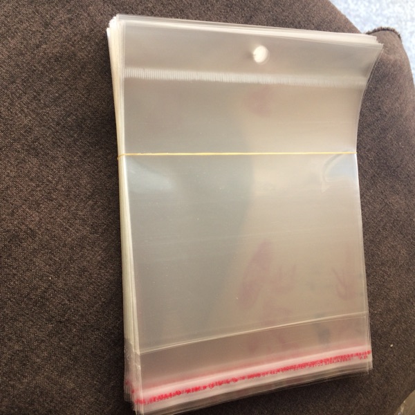 Spot wholesale 7 wire 10 * 15 transparent bag self - tape - taste headdress and other packaging bag card hole