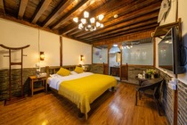 Первый уютный номер с двуспальной кроватью в старом городе Лицзяна Tujian Inn