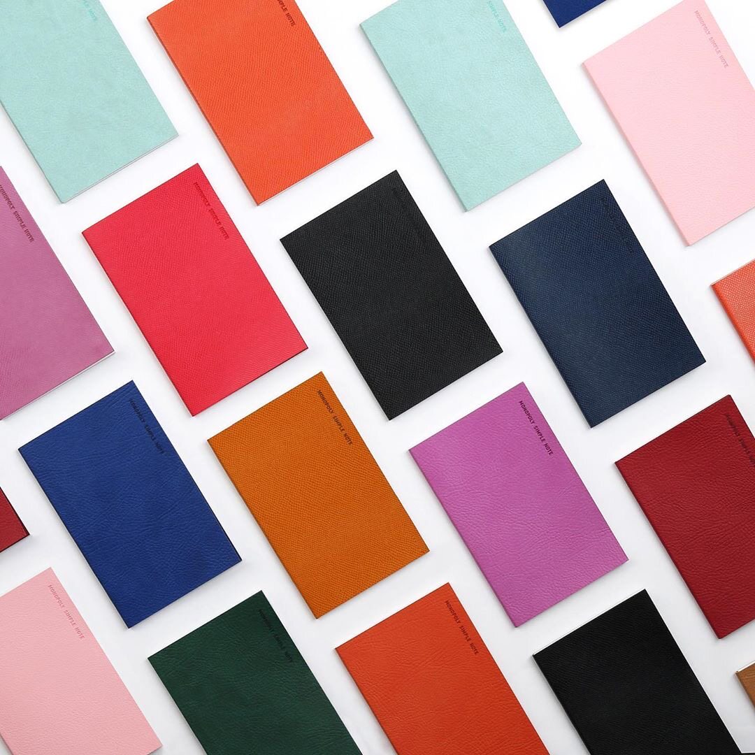 South Korea's Monopoly business leather hand holding a small notepad portable notebook simple cross-line small book