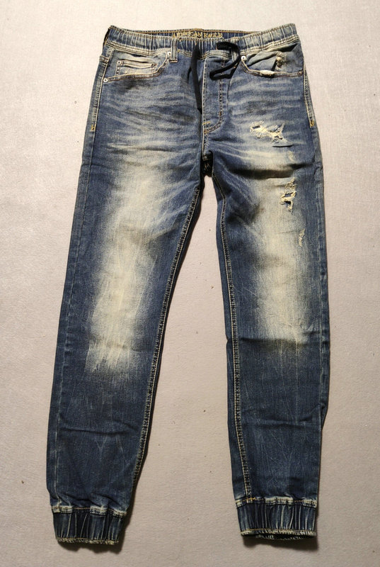 American Ae Eagle 1828 Washed, Distressed, Patched, Vintage-Style, Elastic Slim-Fit, Cuffed Jeans