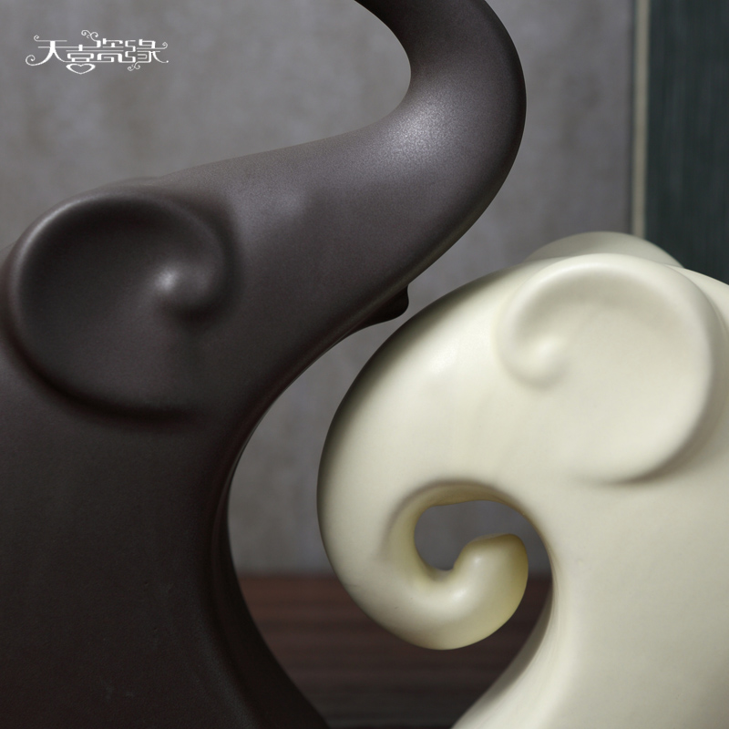 The Nordic idea of modern living room TV cabinet a pair of home decoration ceramic elephant furnishing articles contracted porch decoration