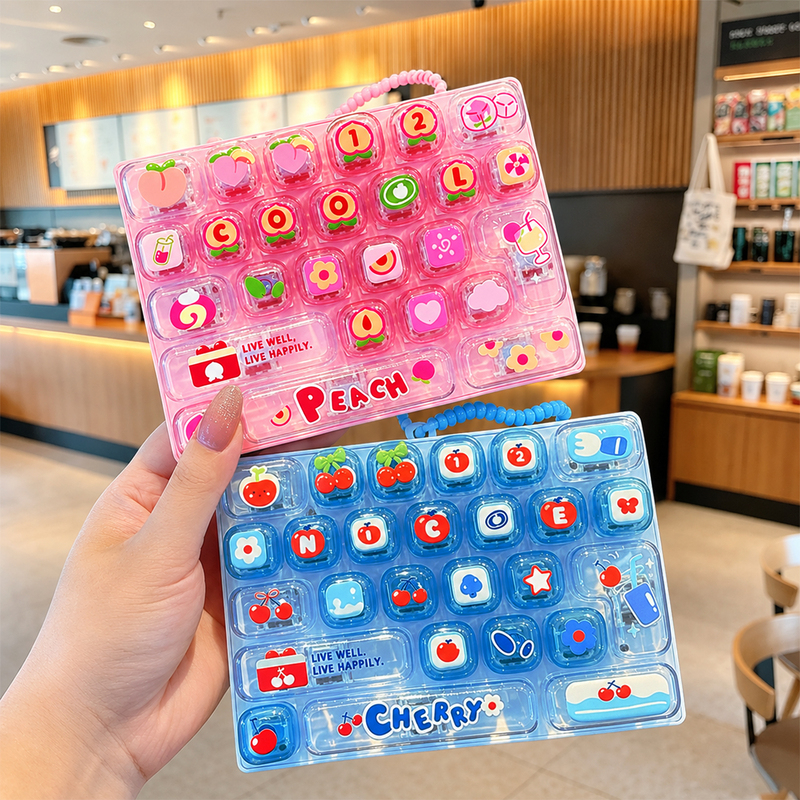 Children's Transparent Peach-Shaped Stress-Relief Keyboard with 26 Keys, High-Value Toy Keychain Children's Transparent Peach-Shaped Stress-Relief Keyboard with 26 Keys, High-Value Toy Keychain