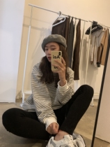 A Little Orange wears split-leg leggings