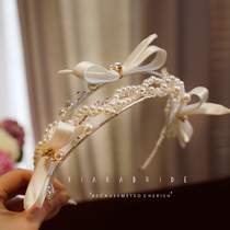Elegant bridal bow tie head accessories Beads Hair Stirrup earrings Costume House Photography Wedding and Makeup Styling Accessories