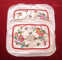 A pair of hand-embroidered pillowcases before and after the founding of the Peoples Republic of China (when his son returned to his family in Guiyi) - a dowry for a girl when she got married.
