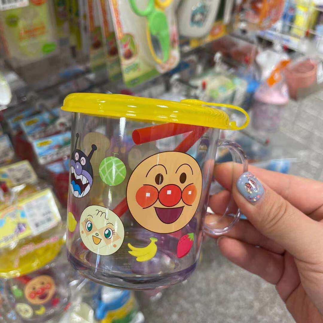 Japan imported Japanese tableware Bread Anpanman Children's baby single handle with lid can be inserted into the straw cup 250ml water cup