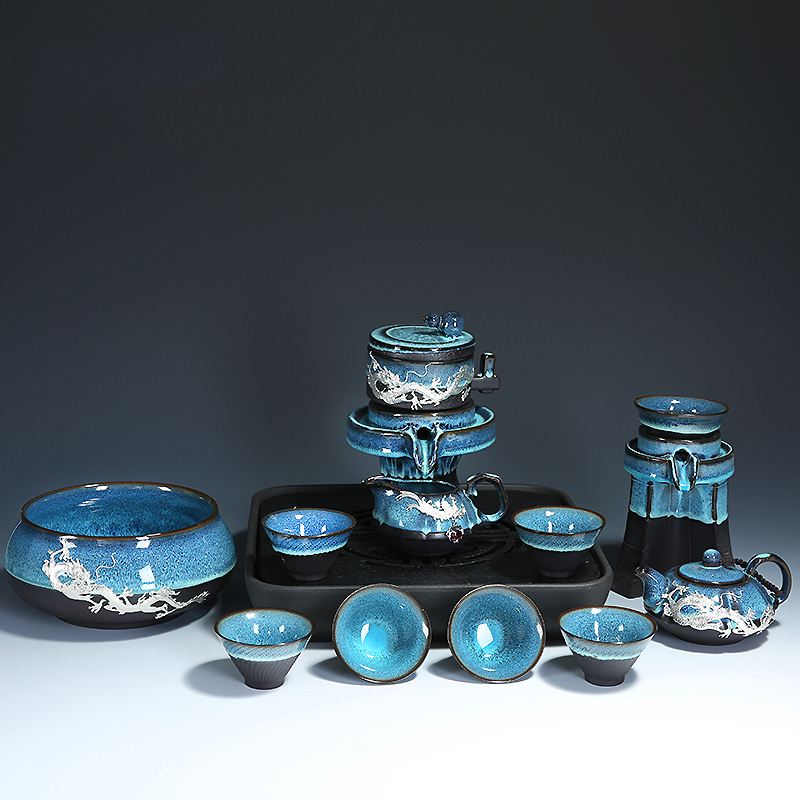 Build light tea set home lazy semi - automatic creative stone mill kung fu tea ware ceramic teapot teacup obsidian