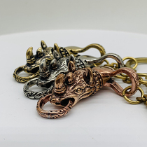 Dongguan broken copper pure copper rhinoceros head bite ring car keychain pendant creative retro male pendant personality small gift