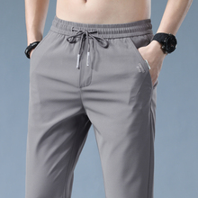 Summer ultra-thin ice silk pants for men, summer breathable sports casual pants for men, loose and tight waist, spring and autumn styles