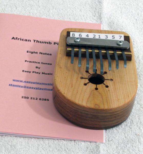 Canada Mua sắm Thumb ◇ Handmade Retro Đặc biệt Nhỏ Thumb Châu Phi Piano Walnut Nhạc cụ phương Tây đàn guitar mini